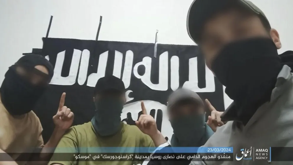 Miembros del grupo terrorista Estado Islámico (EI) en parte del video. Foto: EFE/Amaq