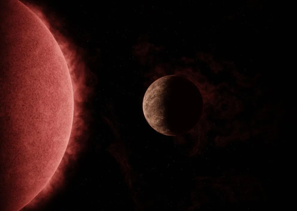Representación artística del exoplaneta SPECULOOS-3 b en órbita alrededor de su estrella enana roja. Foto: EFE