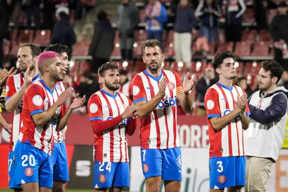 Los jugadores del Girona celebran uno de sus triunfos en este año. Foto EFE