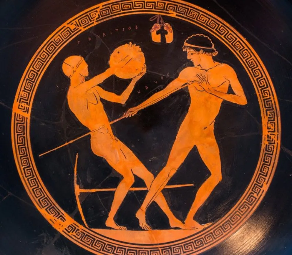 Atletas de la antigüedad se entrenan para el lanzamiento de la jabalina y del disco. Foto: National Geographic