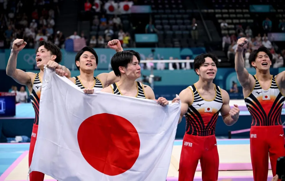El equipo japonés de gimnasia artística, uno de los que lograron el oro. Foto EFE