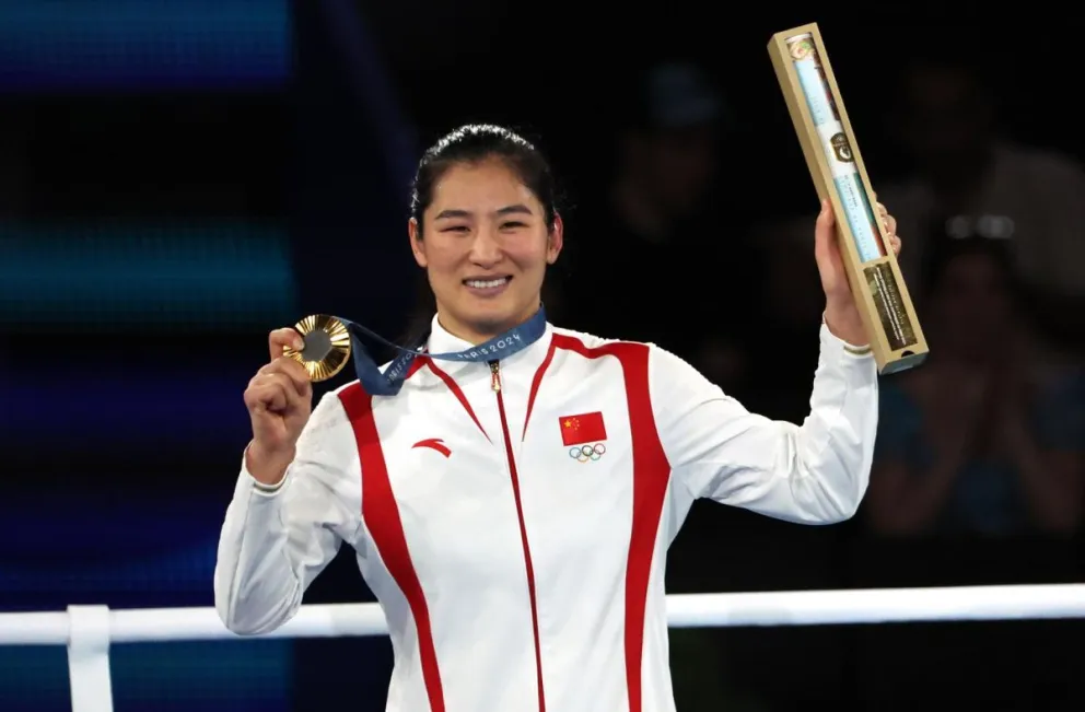 La medallista de oro Li Qian en Roland Garros en Paris. Foto: EFE