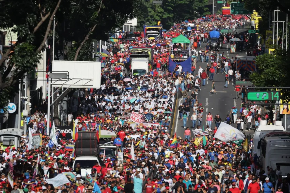 Simpatizantes del presidente de Venezuela, Nicolás Maduro, asisten a una marcha este miércoles, en Caracas (Venezuela). Foto: EFE