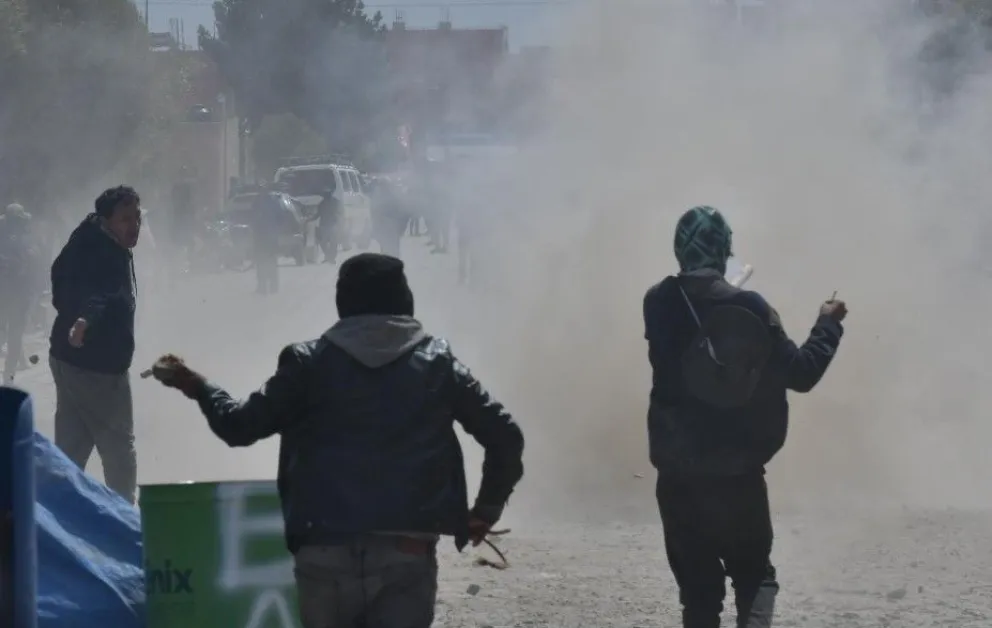Grupos de choque del evismo y arcismo se enfrentaron sin tregua en Ventilla. Foto: APG