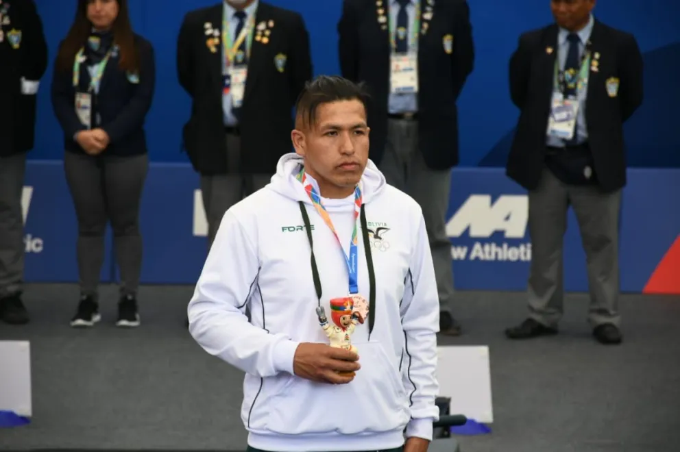 Lafferty con su presea de bronce en la premiación. Foto: COB.