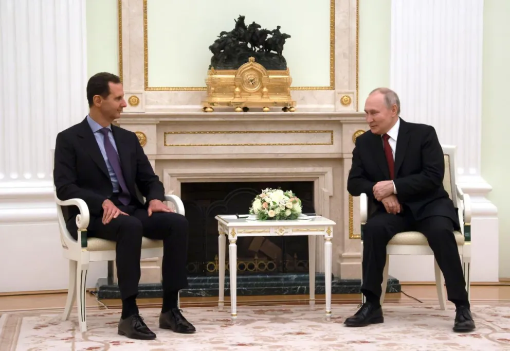 El presidente ruso, Vladímir Putin, junto al depuesto mandatario de Siria, Bachar al Asad, el 14 de marzo de 2023 durante un encuentro en el Kremlin. Foto: EFE