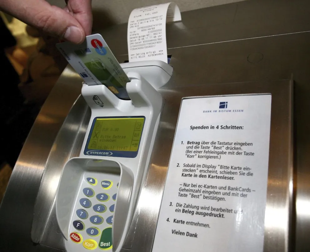 Un modelo de cajero electrónico para limosnas, imagen referencial. Foto: EFE