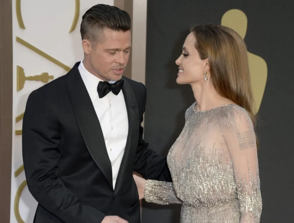 La actriz Angelina Jolie y el actor Brad Pitt en una imagen durante la entrega de los Oscar en 2014. Foto: EFE