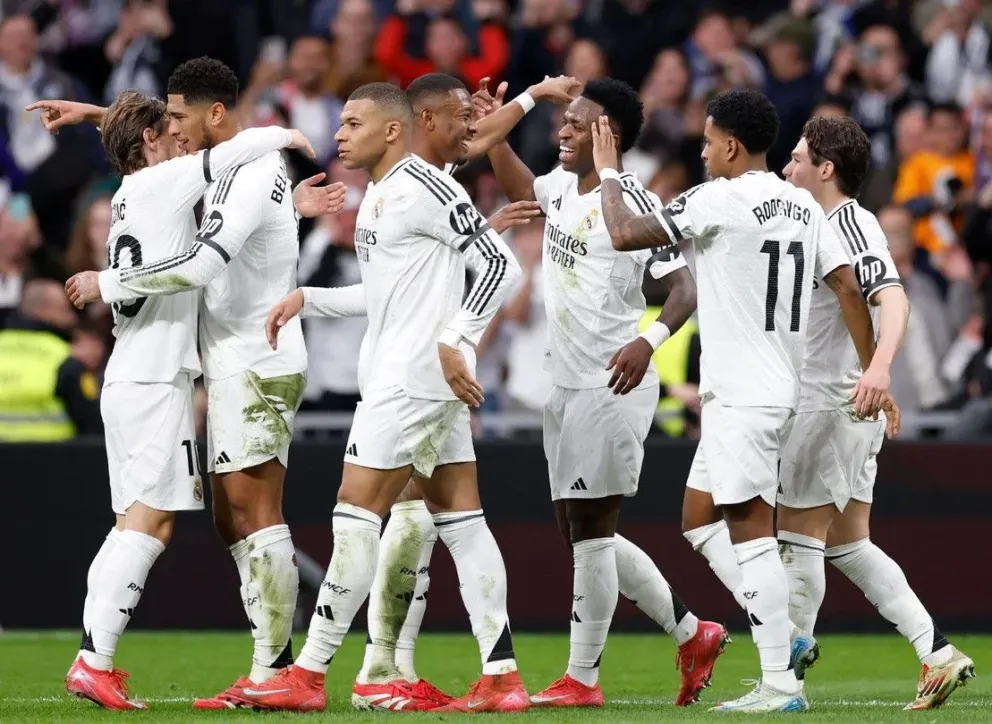 Los jugadores del Real Madrid festejan el segundo gol ante el Rayo marcado por Vinicius (centro). Foto: Real Madrid