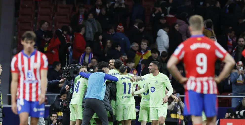 La pena por la derrota del Atlético Madrid y la alegría del Barcelona. Foto: EFE