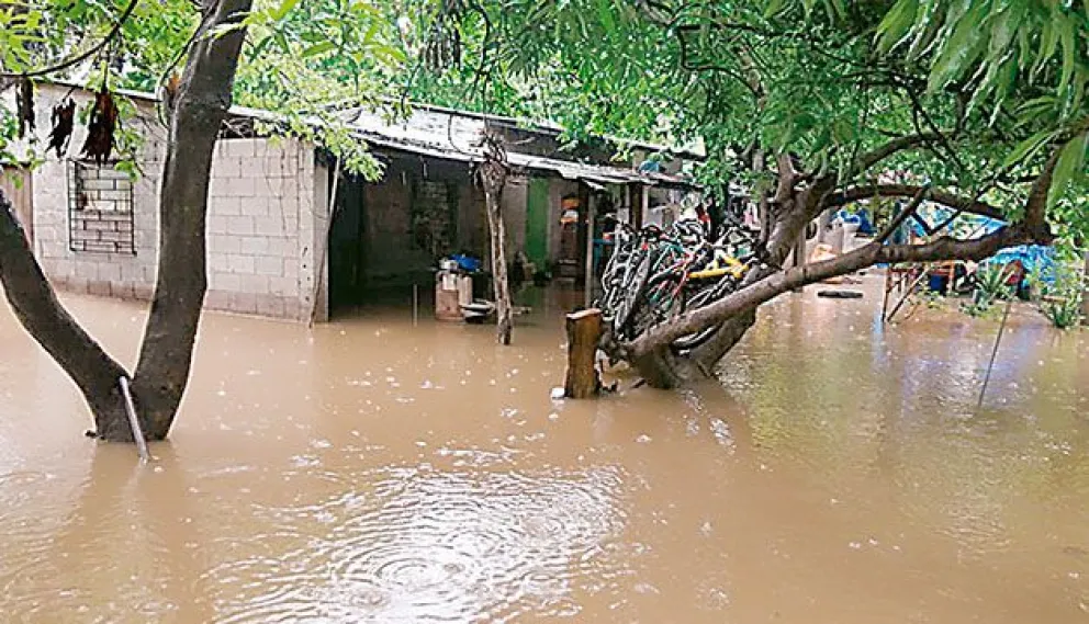 Una comunidad afectada por el desborde del río Grande. Foto: El Mundo