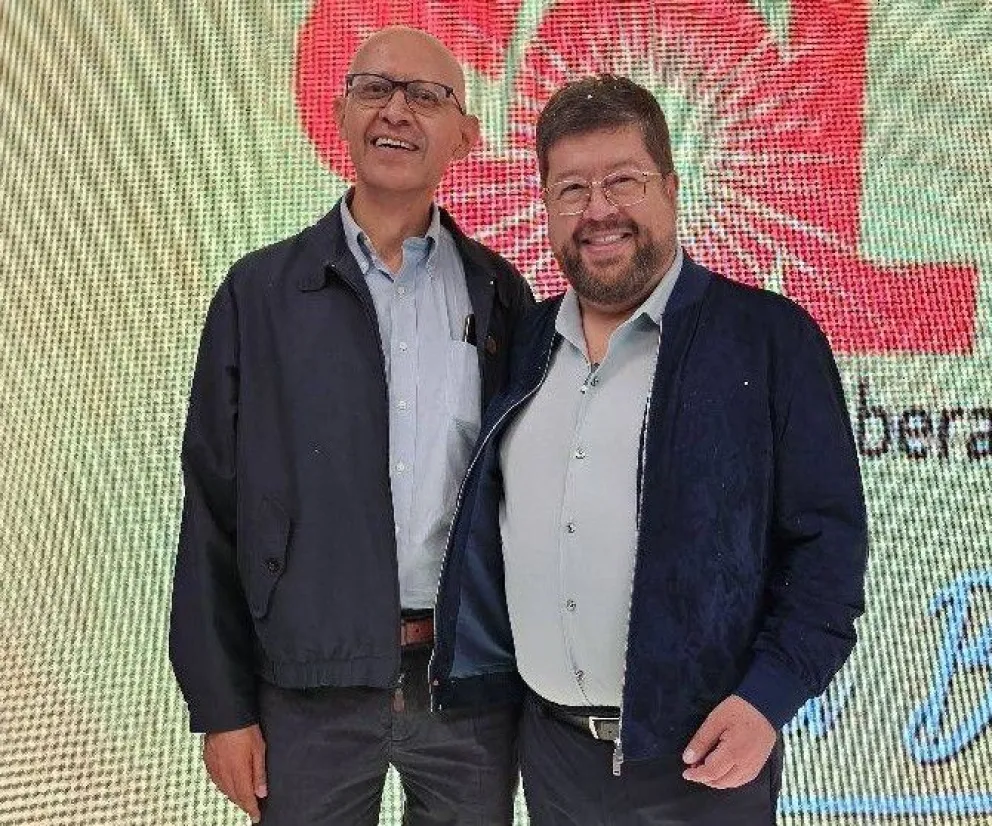 Roberto Moscoso, secretario ejecutivo de UN, junto a Doria Medina, líder de se partido. Foto: RRSS del político 