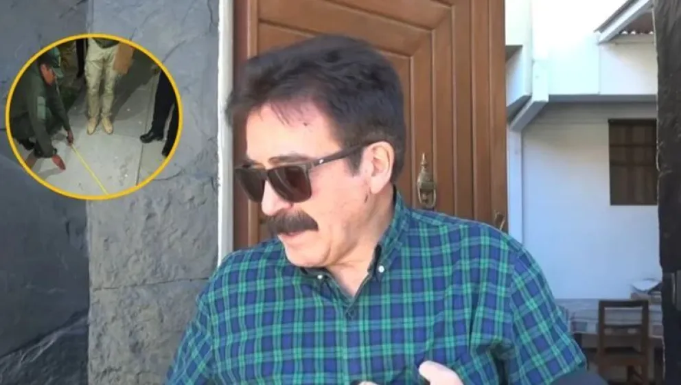 El vocal Humberto Valenzuela con una imagen de la investigación de la explosión. Foto: Red Uno