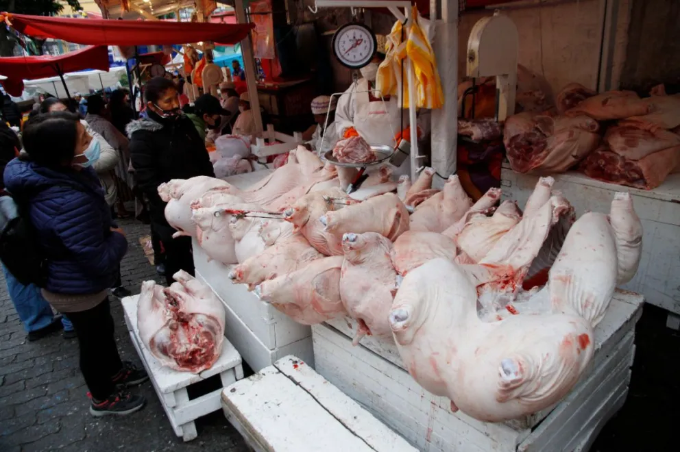 Un puesto de venta de carne de cerdo. Foto: ABI