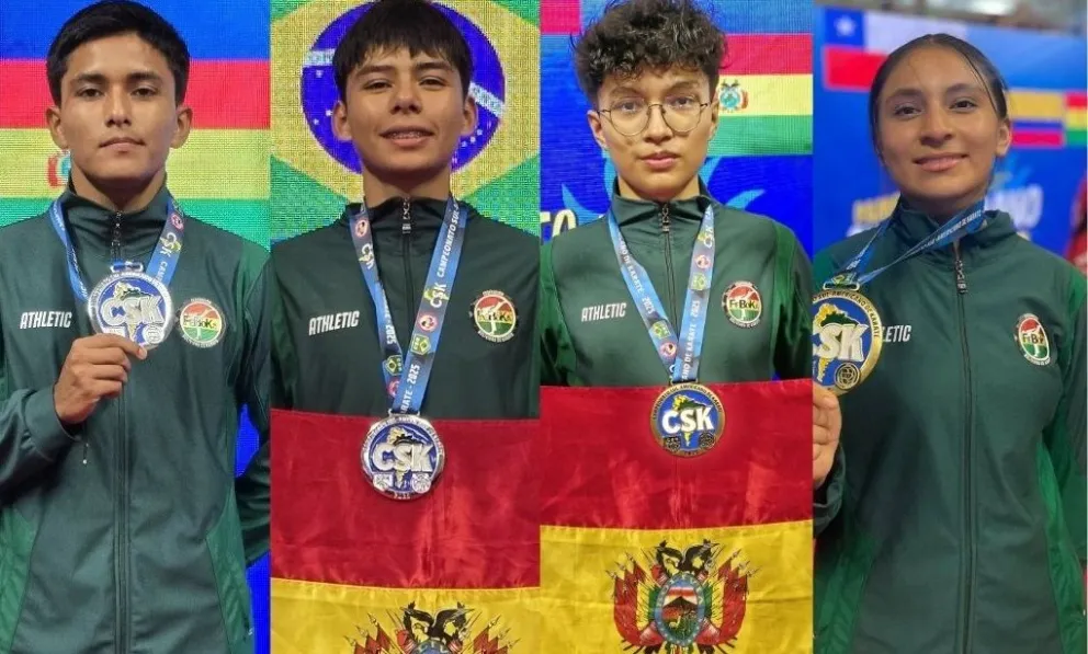 Cuatro de los cinco medallistas que tuvo Bolivia. Foto: Feboka.