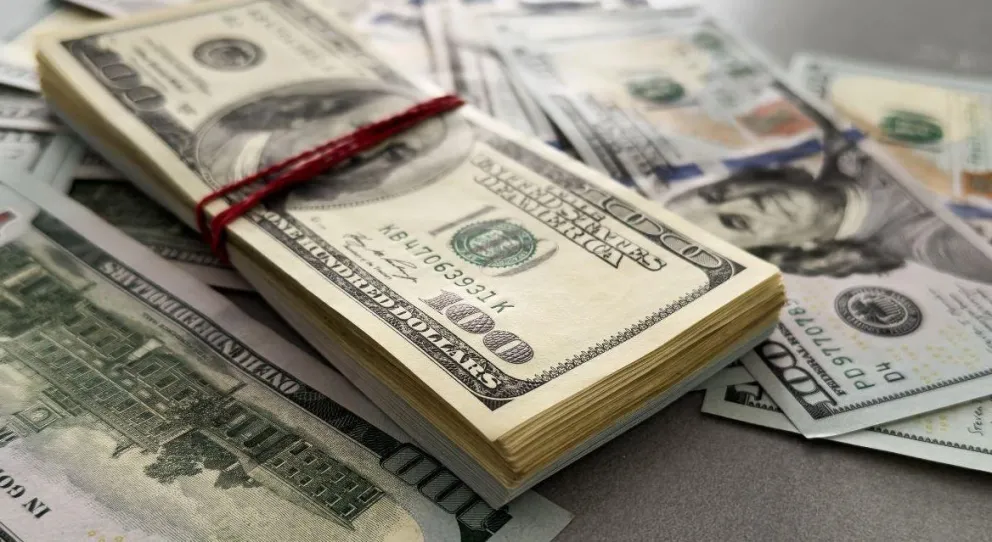 Dólares en una imagen referencial. Foto: RRSS