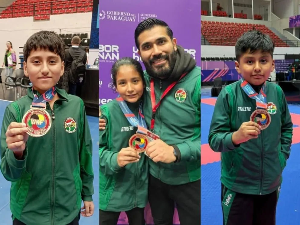 Los tres deportistas con sus medallas. Foto: Feboka.