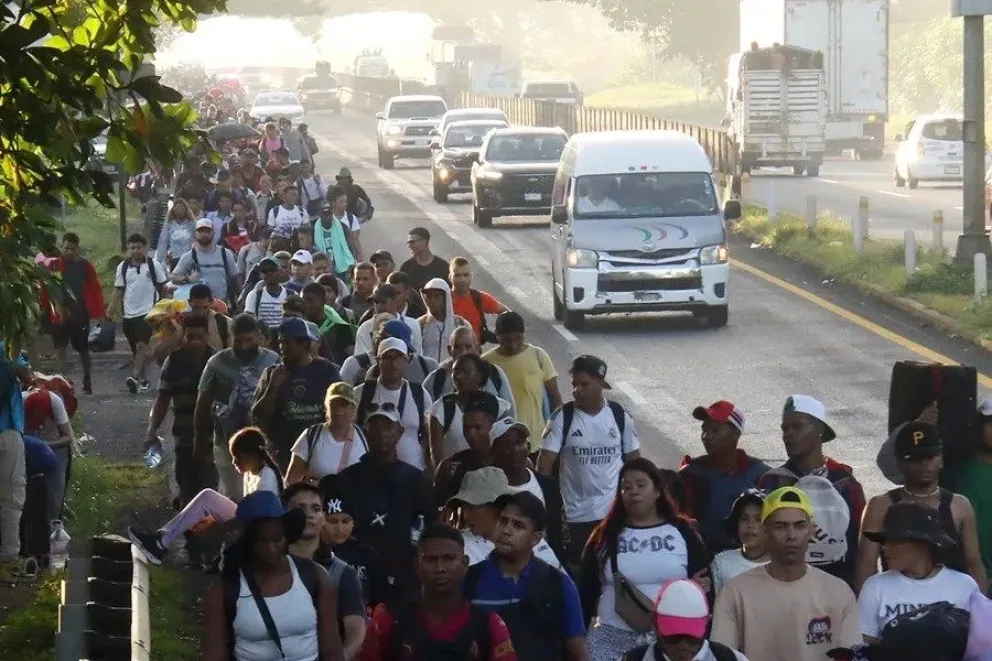 Fotografía de archivo de un grupo de migrantes participando en una manifestación en Tapachuca (México). EFE