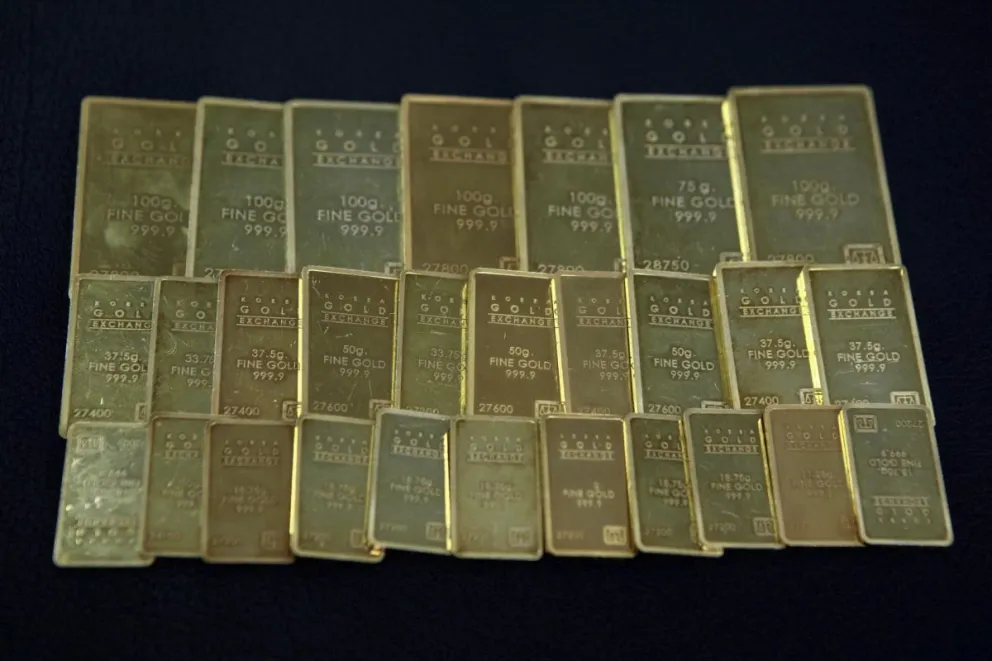 Barras de oro expuestas en una oficina de compra-venta de oro en Seúl. Foto: EFE
