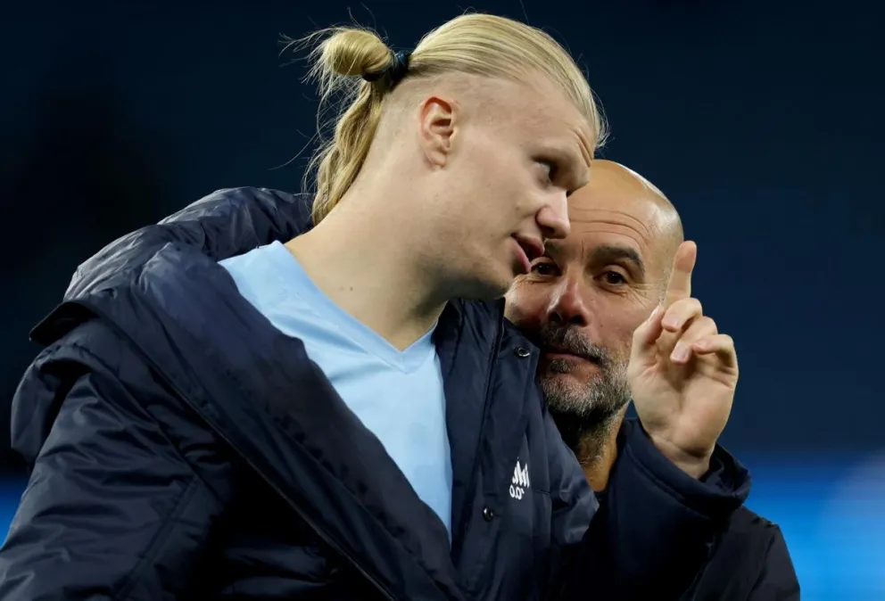 Foto de archivo del delantero noruego del Manchester City Erling Haaland y del técnico español Pep Guardiola. Crédito: EFE