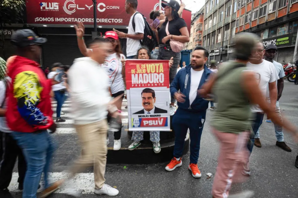 Un cartel con la imagen de Maduro durante una marcha el pasado domingo, en Caracas. Foto: EFE