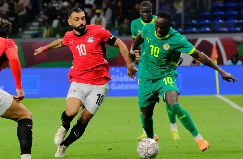 Los excompañeros del Liverpool: Salah (izq.), de Egipto, y Mané, de Senegal. Foto: EFE.