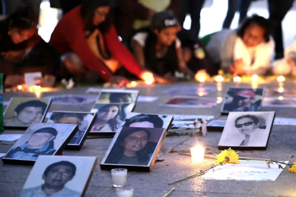 Fotografía de archivo que muestra imágenes de defensores asesinados y desaparecidos en Ciudad de México (México). Foto: EFE