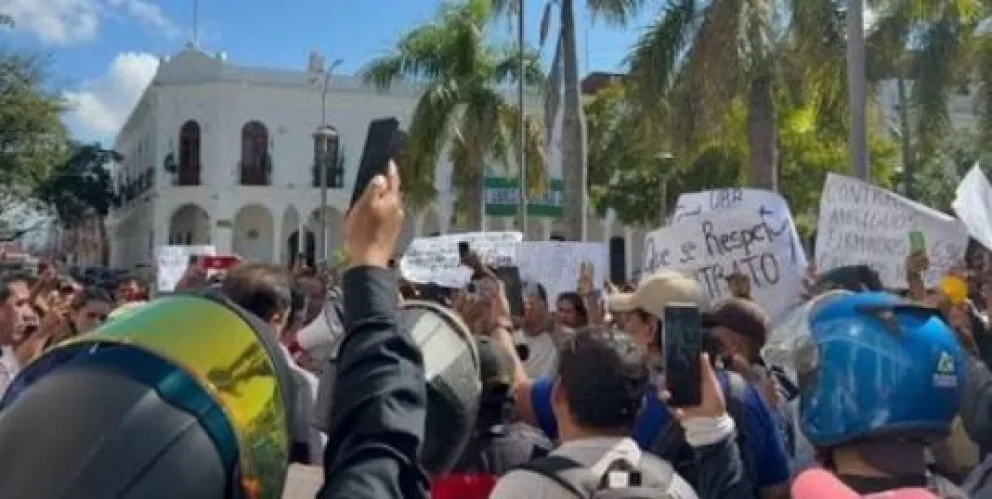 Protesta exigiendo mantenimiento del dólar en contratos de compra de terrenos de inmobiliarias. Foto. Captura de imagen