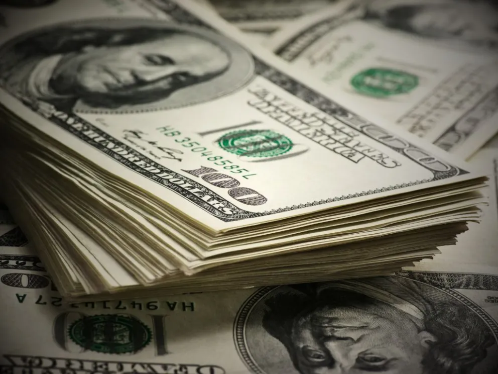 Varios billetes de la moneta de EEUU. Foto: Canva 