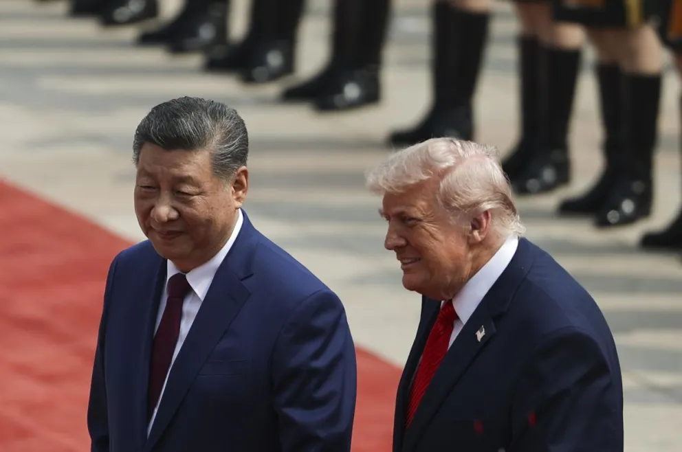 Una reunión previa entre el presidente de China, Xi Jinping, y su par estadounidense, Donald Trump, en Pekín. Foto: EFE 